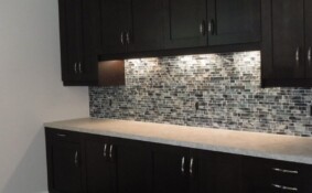 Pine Hall Spruce room countertop with glass tile backsplash